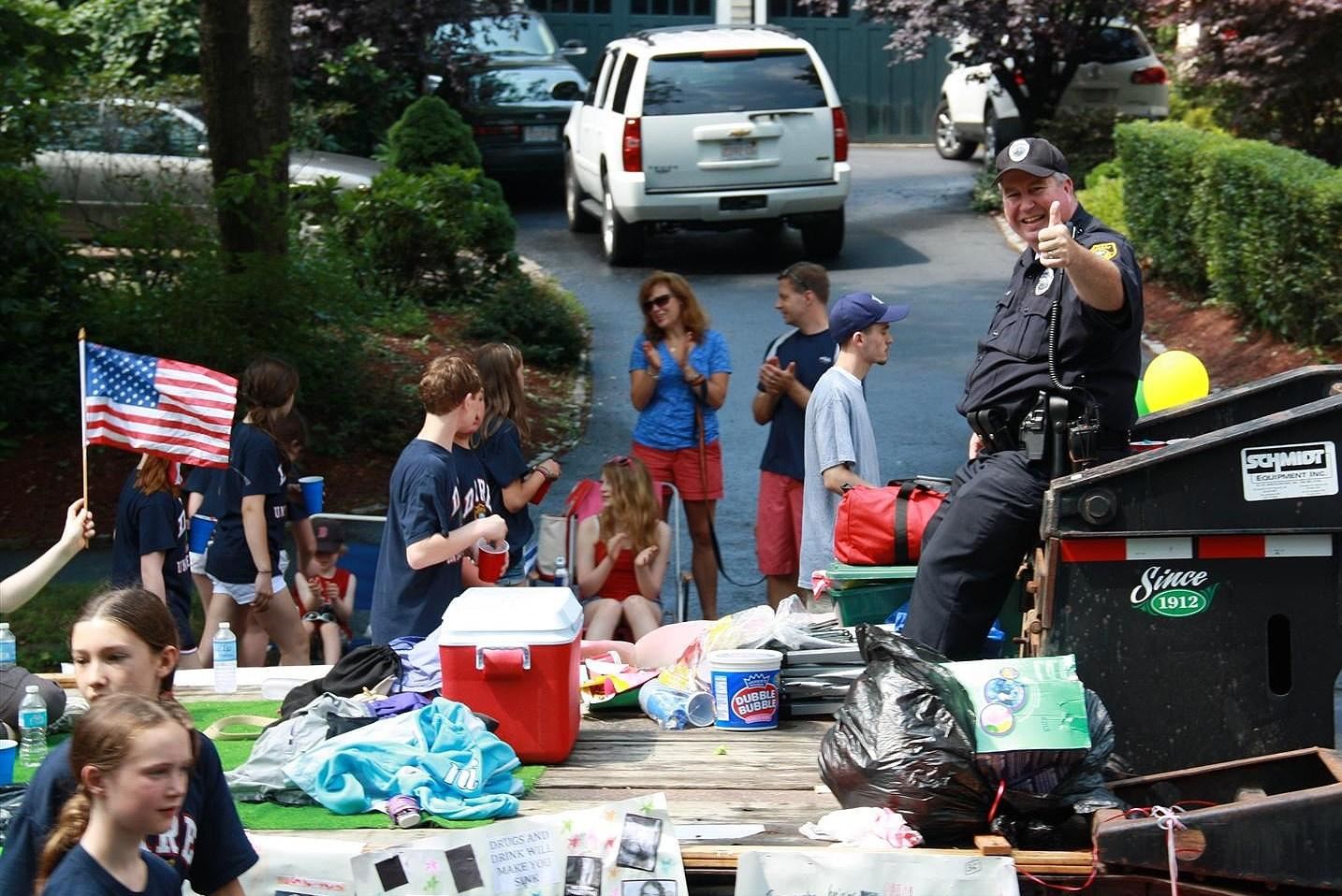 DARE Officer Robert Ramsey waves to the crowd